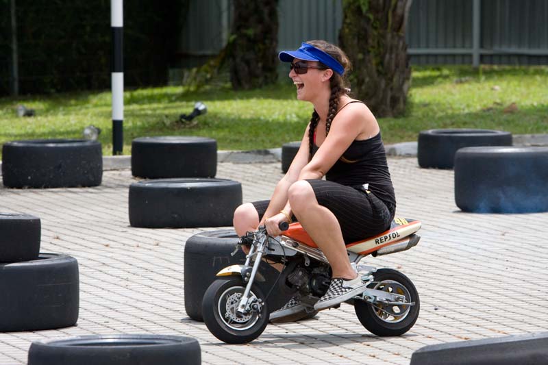 tourist girl on mini bike Malaysia Pictures - Kuala Lumpur Pictures