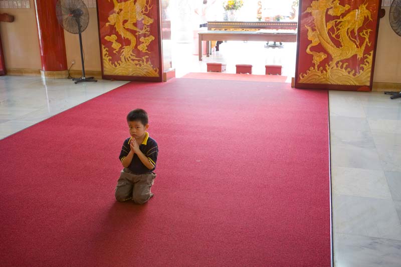 little boy praying two Malaysia Pictures - Kuala Lumpur Pictures